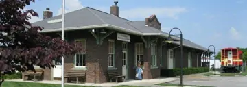 Historic Crossville Depot with the caboose visible nearby